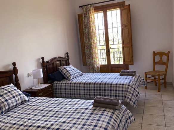 Quart doble amb llits individuals casa rural Mas Maria